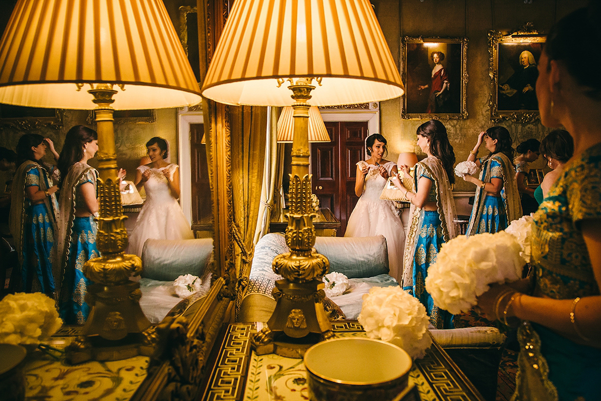 Sabrina and Nick had a multicultural wedding including an Anglican and Hindu ceremony at Syon Park in London. Sabrina wore Pronovias. Photography by Viva La weddings.