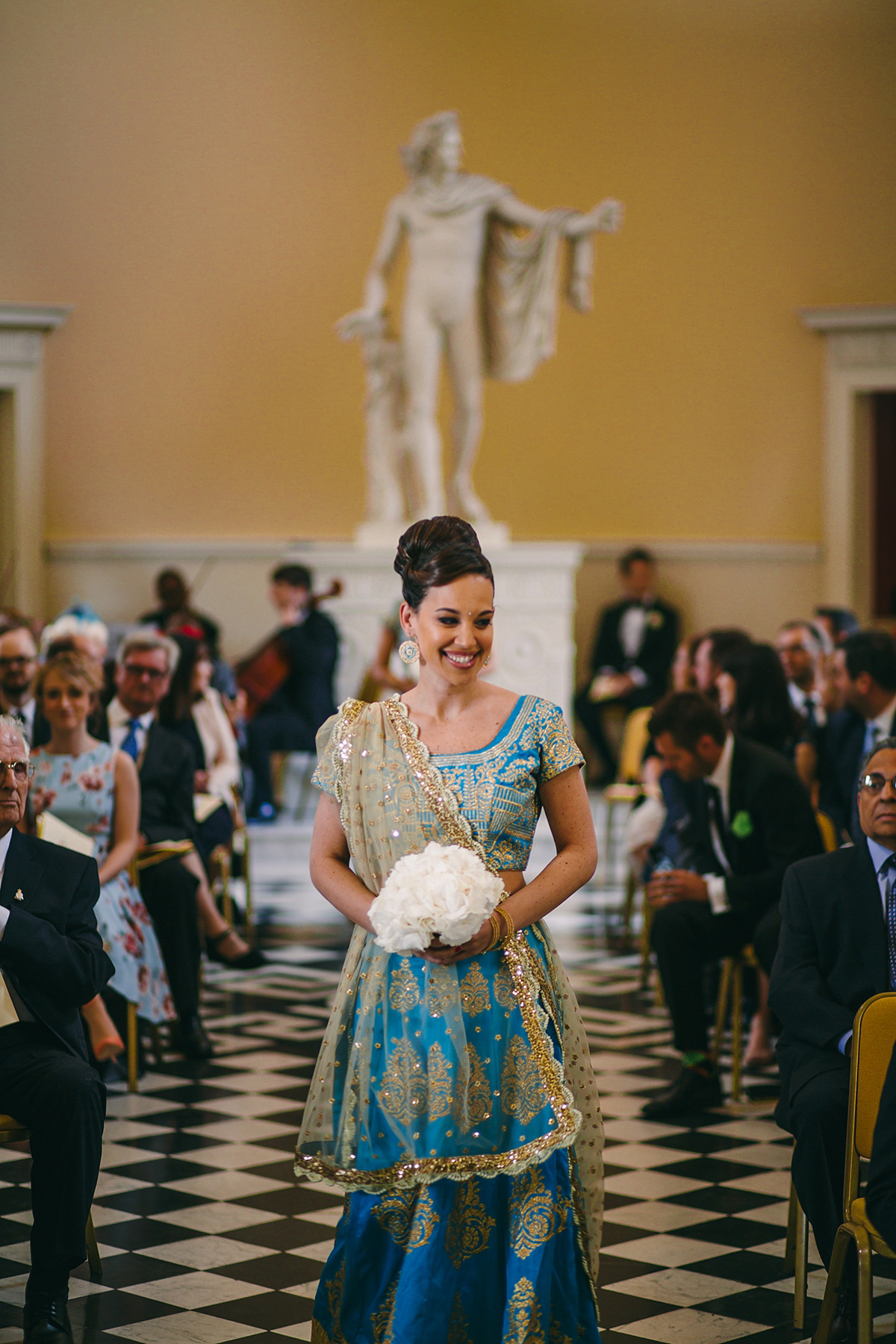 Sabrina and Nick had a multicultural wedding including an Anglican and Hindu ceremony at Syon Park in London. Sabrina wore Pronovias. Photography by Viva La weddings.