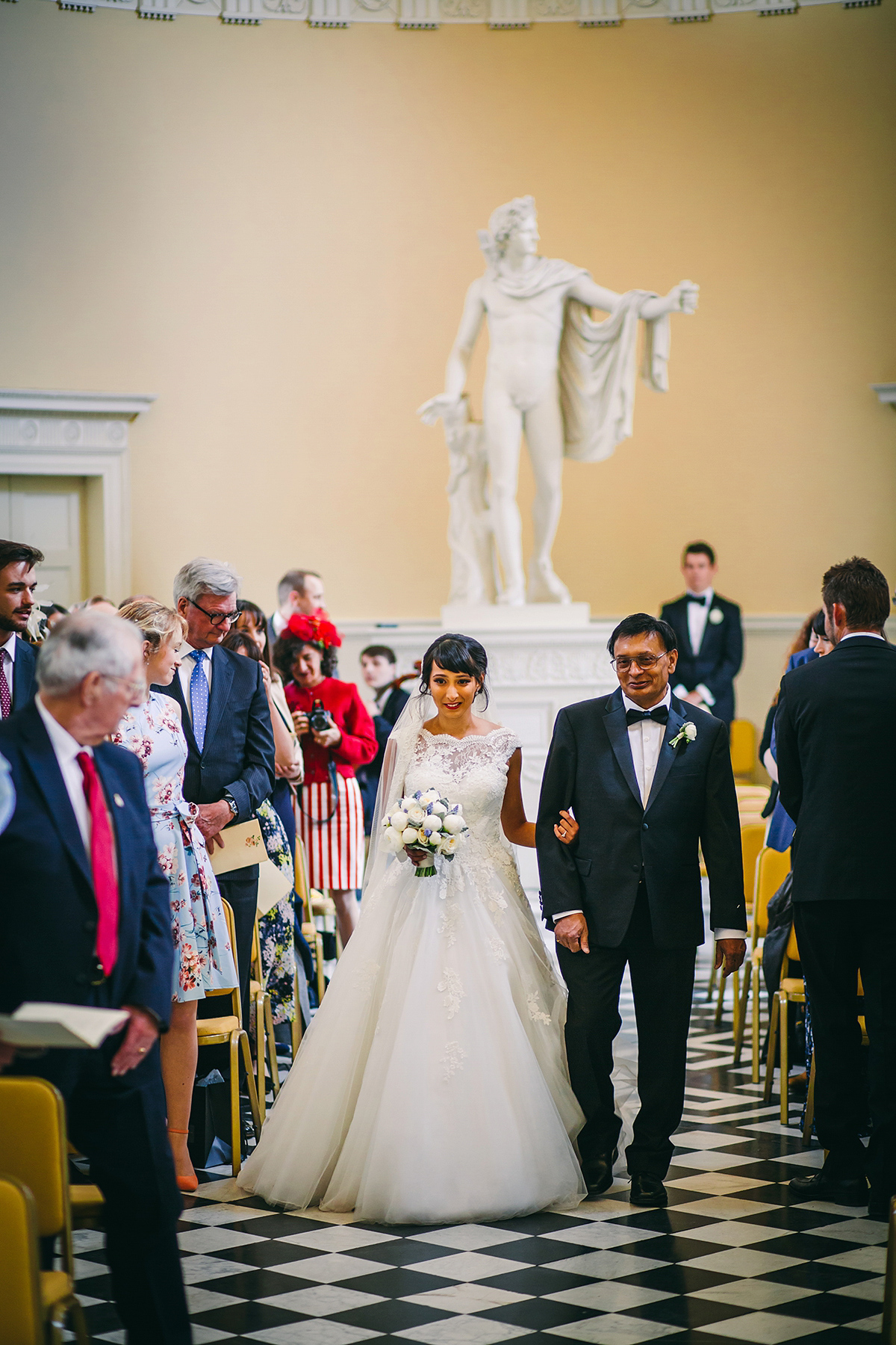 Sabrina and Nick had a multicultural wedding including an Anglican and Hindu ceremony at Syon Park in London. Sabrina wore Pronovias. Photography by Viva La weddings.