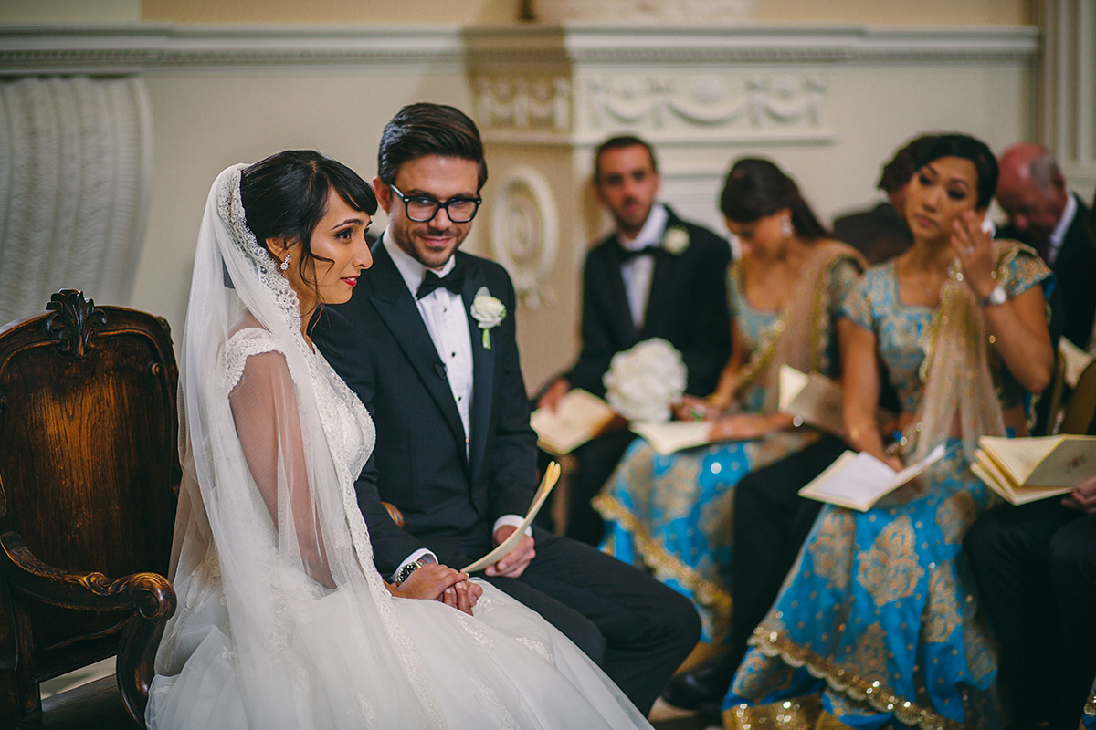 Sabrina and Nick had a multicultural wedding including an Anglican and Hindu ceremony at Syon Park in London. Sabrina wore Pronovias. Photography by Viva La weddings.