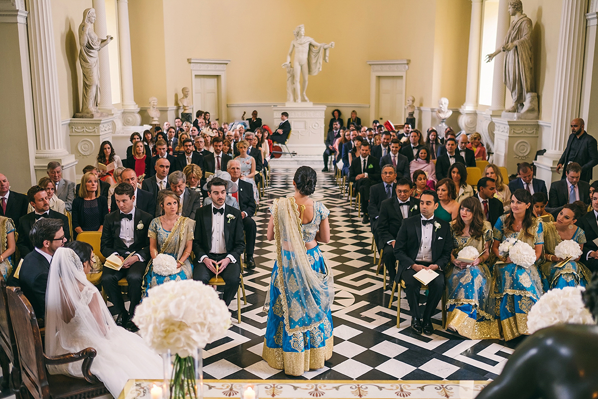 Sabrina and Nick had a multicultural wedding including an Anglican and Hindu ceremony at Syon Park in London. Sabrina wore Pronovias. Photography by Viva La weddings.