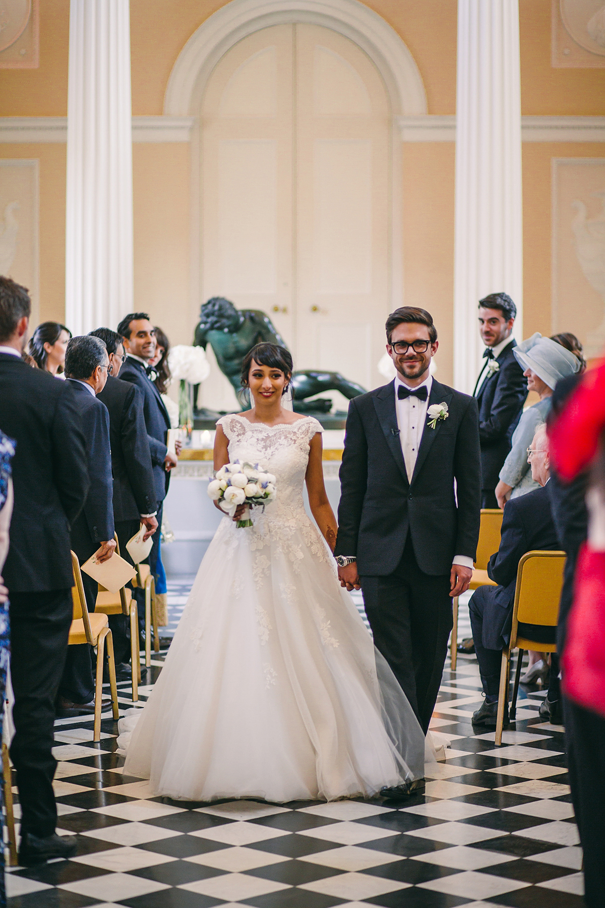 Sabrina and Nick had a multicultural wedding including an Anglican and Hindu ceremony at Syon Park in London. Sabrina wore Pronovias. Photography by Viva La weddings.