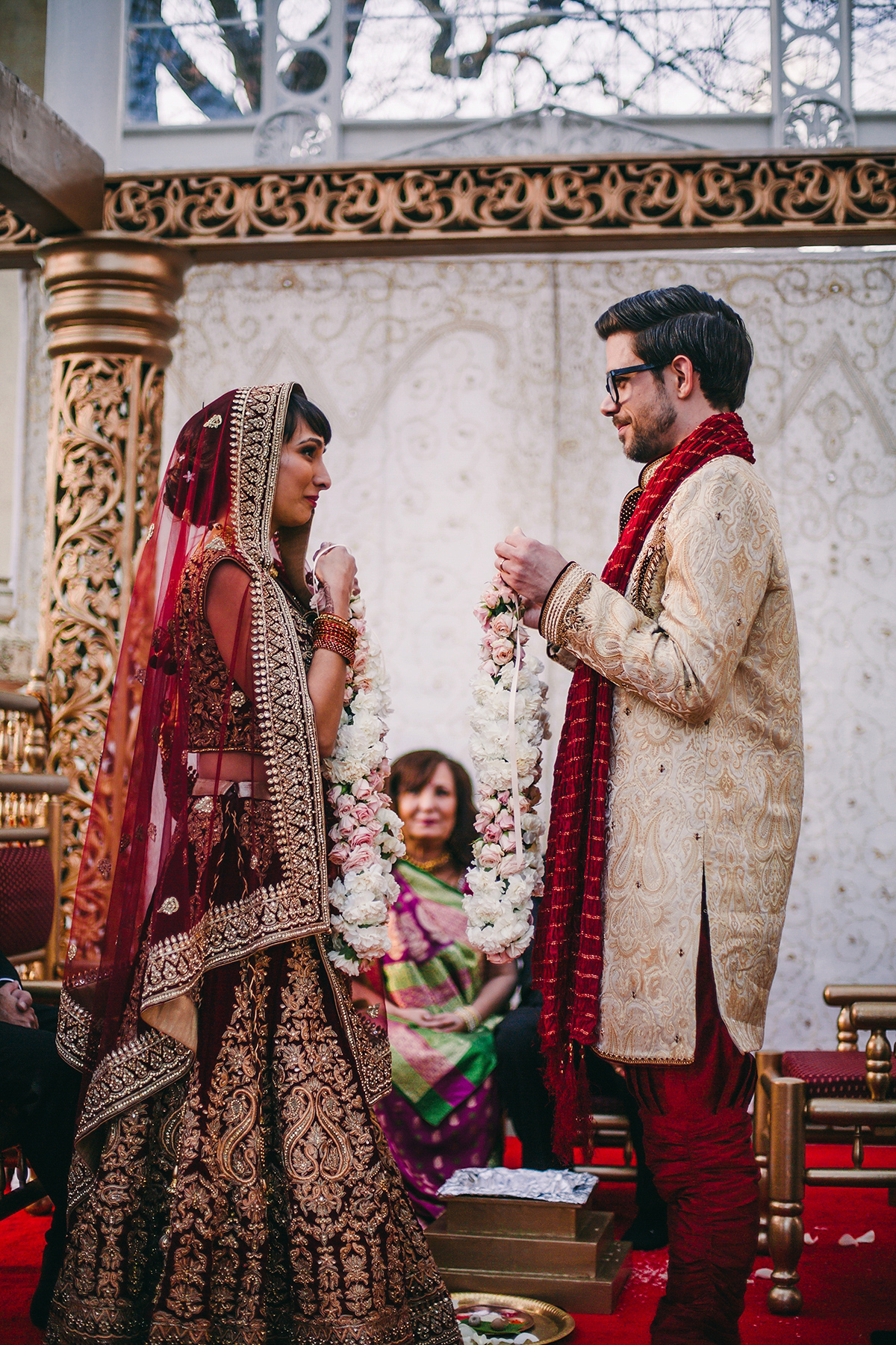 Sabrina and Nick had a multicultural wedding including an Anglican and Hindu ceremony at Syon Park in London. Sabrina wore Pronovias. Photography by Viva La weddings.