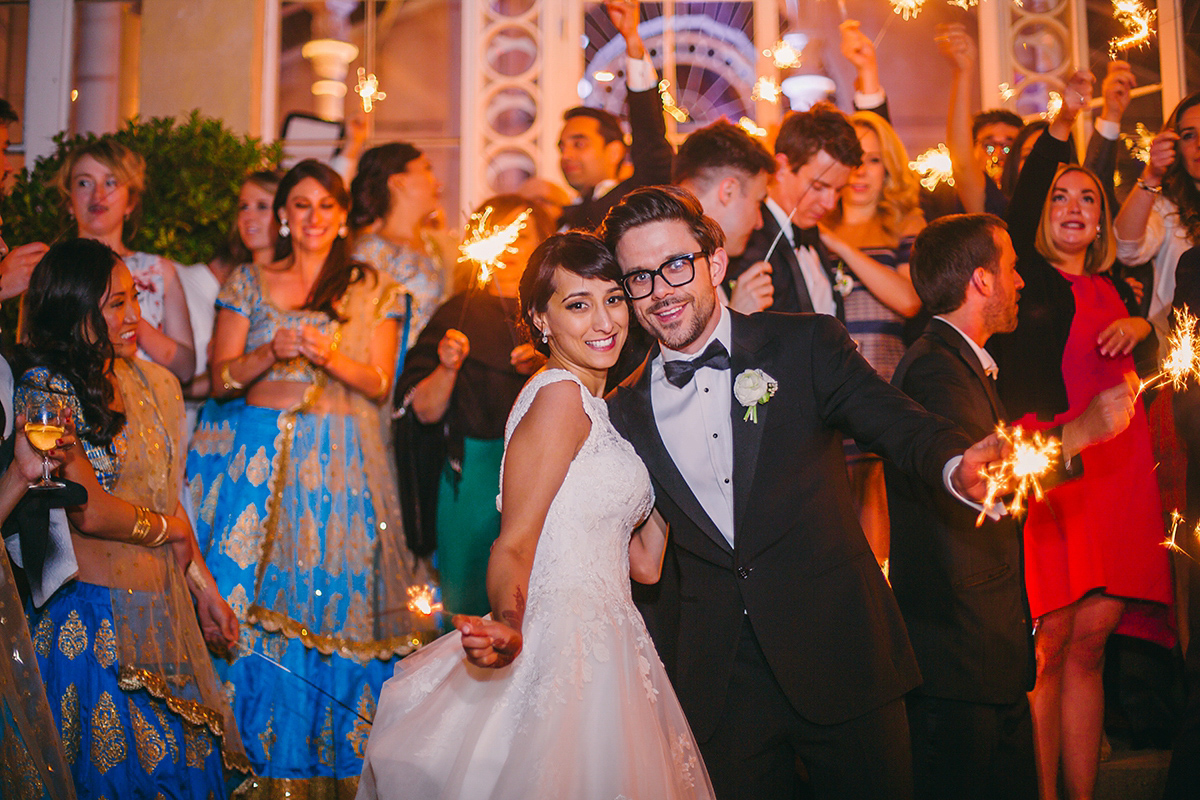 Sabrina and Nick had a multicultural wedding including an Anglican and Hindu ceremony at Syon Park in London. Sabrina wore Pronovias. Photography by Viva La weddings.