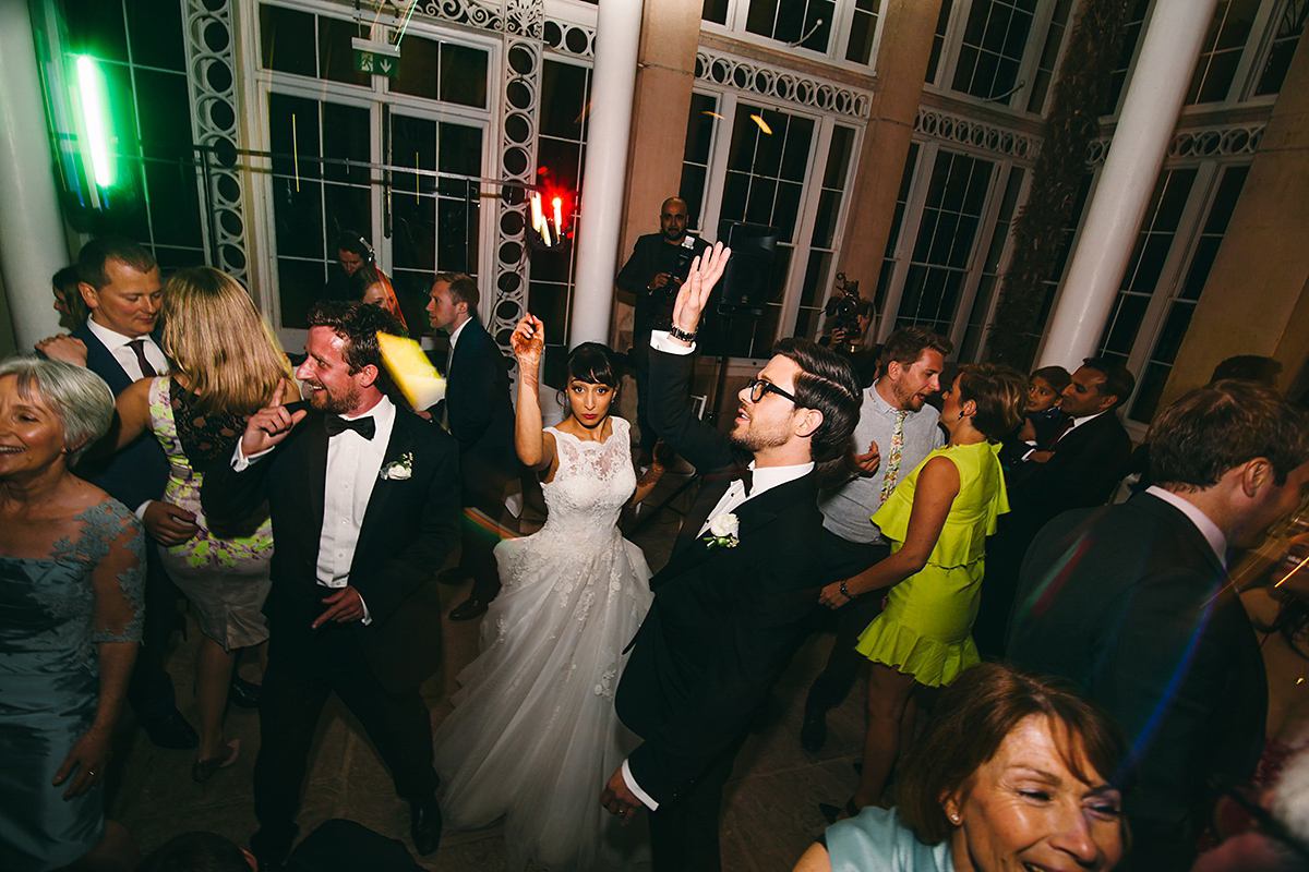 Sabrina and Nick had a multicultural wedding including an Anglican and Hindu ceremony at Syon Park in London. Sabrina wore Pronovias. Photography by Viva La weddings.