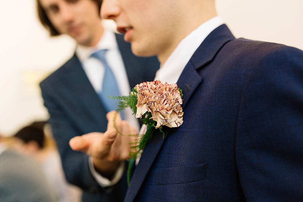 Celine wore a short, chic, pale pink wedding dress for her non-traditional wedding at the Greenwich Yacht Club in London. Captured by Paul Joseph Photography.