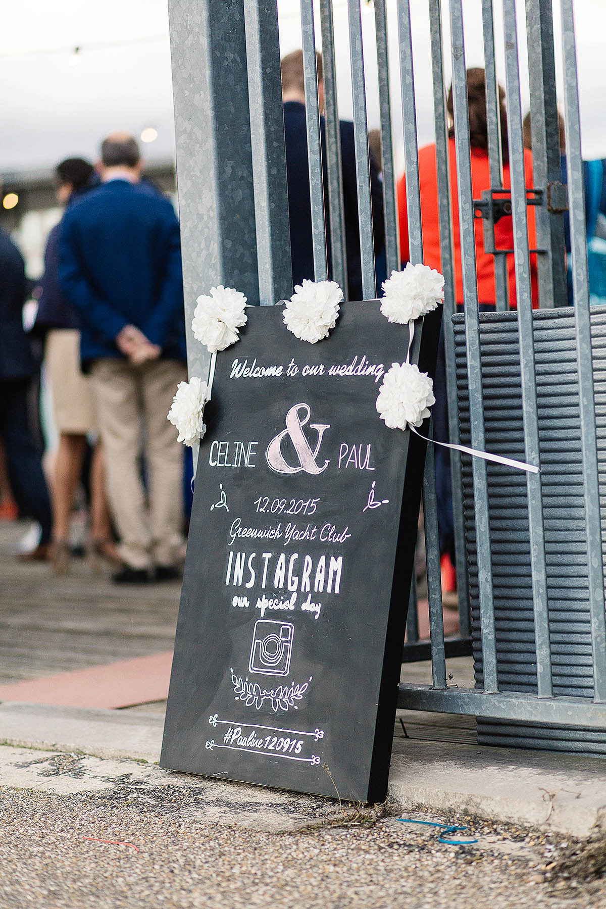 Celine wore a short, chic, pale pink wedding dress for her non-traditional wedding at the Greenwich Yacht Club in London. Captured by Paul Joseph Photography.