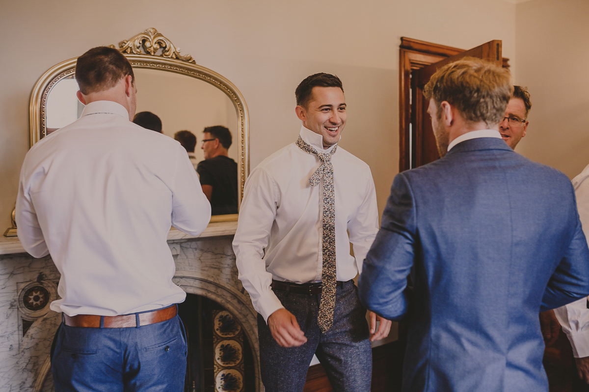 Bride Lucy wore the 'Peony' gown by Naomi Neoh for her romantic and elegant gin inspired wedding in the Lake District. Photography by Lottie Elizabeth.