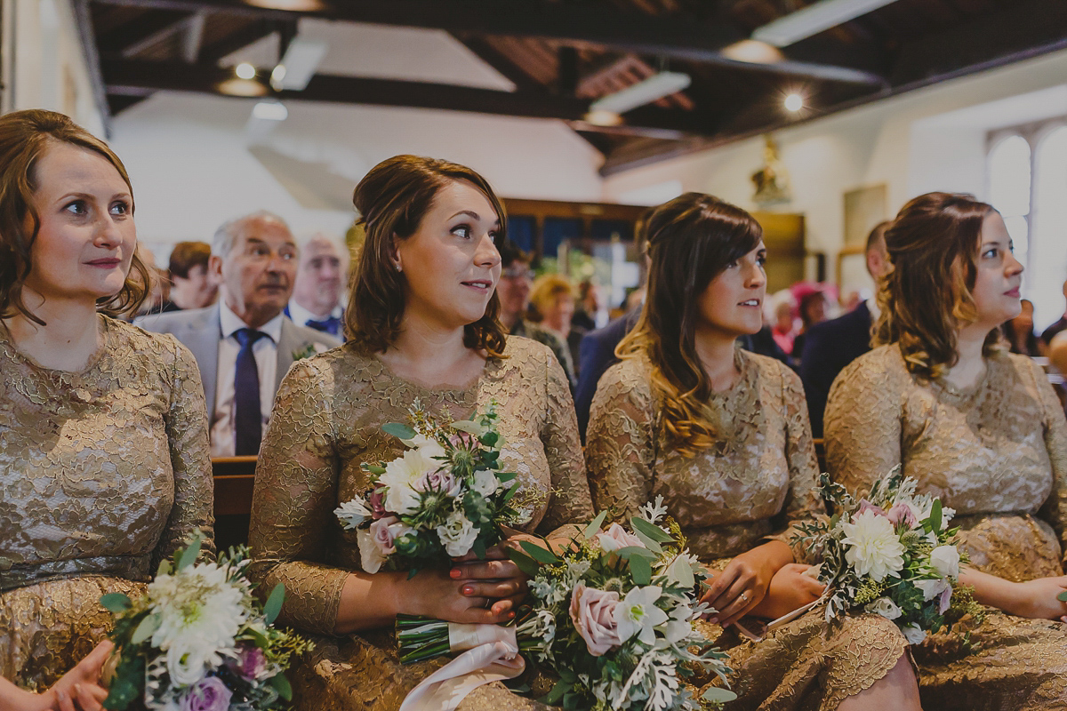 Bride Lucy wore the 'Peony' gown by Naomi Neoh for her romantic and elegant gin inspired wedding in the Lake District. Photography by Lottie Elizabeth.