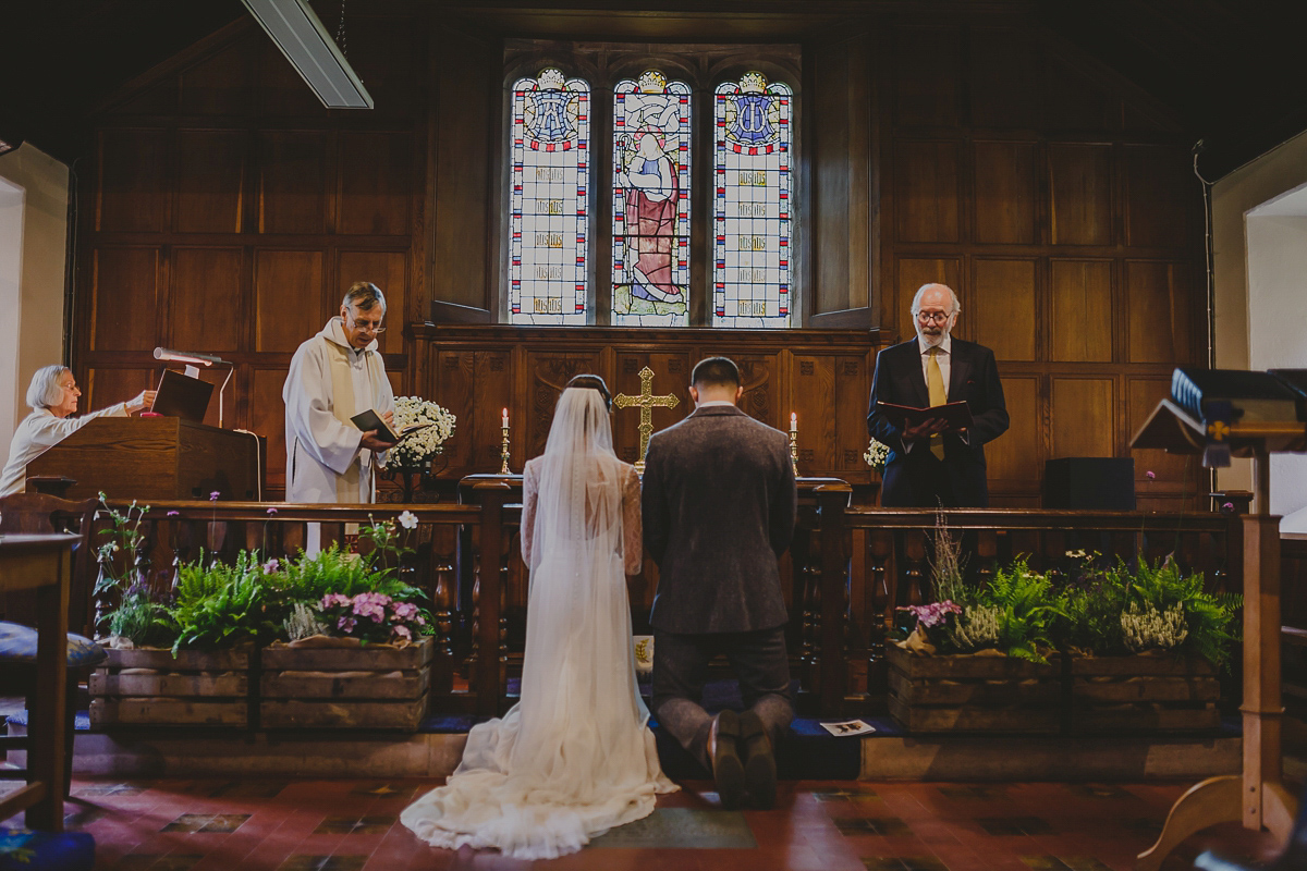 Bride Lucy wore the 'Peony' gown by Naomi Neoh for her romantic and elegant gin inspired wedding in the Lake District. Photography by Lottie Elizabeth.