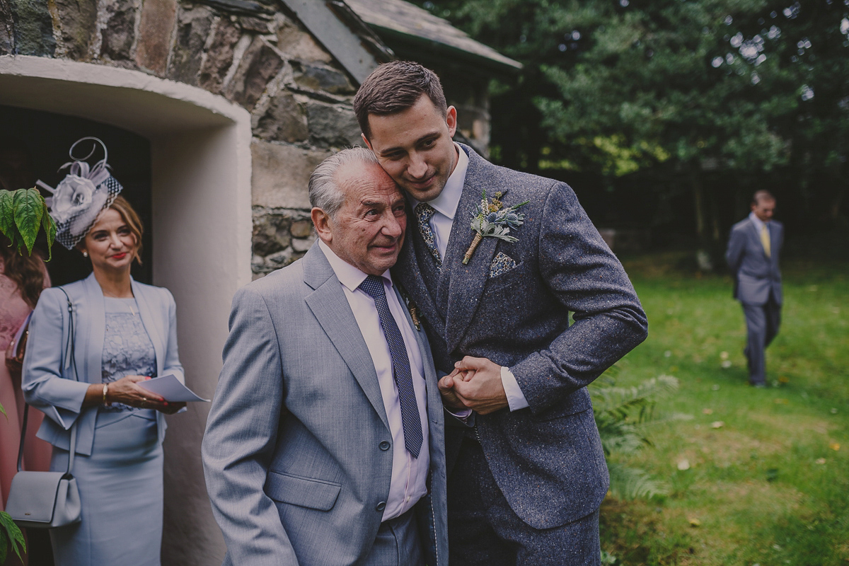 Bride Lucy wore the 'Peony' gown by Naomi Neoh for her romantic and elegant gin inspired wedding in the Lake District. Photography by Lottie Elizabeth.