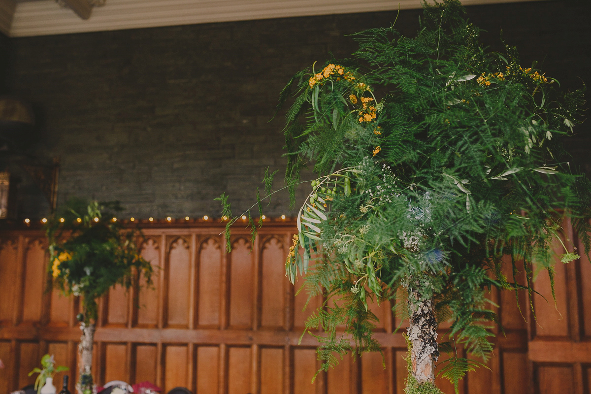 Bride Lucy wore the 'Peony' gown by Naomi Neoh for her romantic and elegant gin inspired wedding in the Lake District. Photography by Lottie Elizabeth.