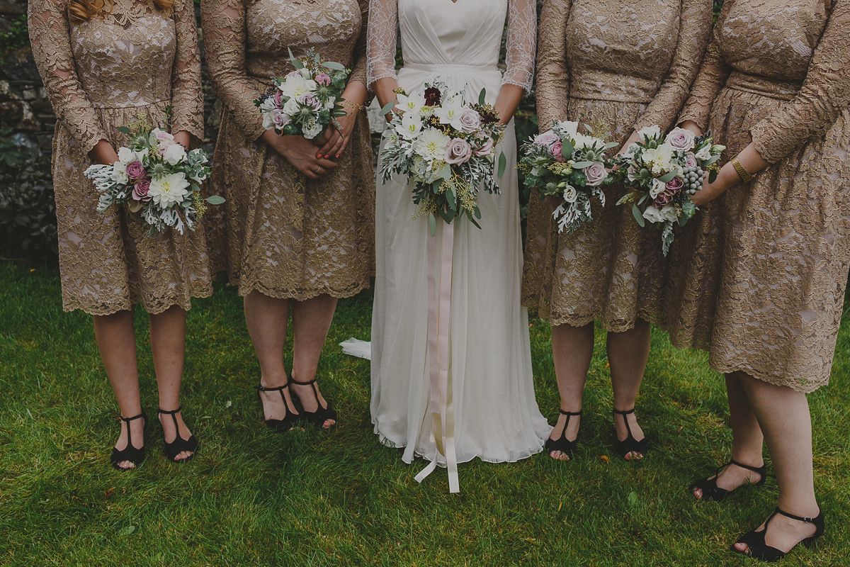 Bride Lucy wore the 'Peony' gown by Naomi Neoh for her romantic and elegant gin inspired wedding in the Lake District. Photography by Lottie Elizabeth.