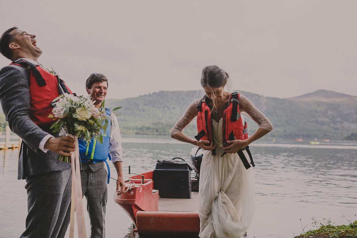 Bride Lucy wore the 'Peony' gown by Naomi Neoh for her romantic and elegant gin inspired wedding in the Lake District. Photography by Lottie Elizabeth.