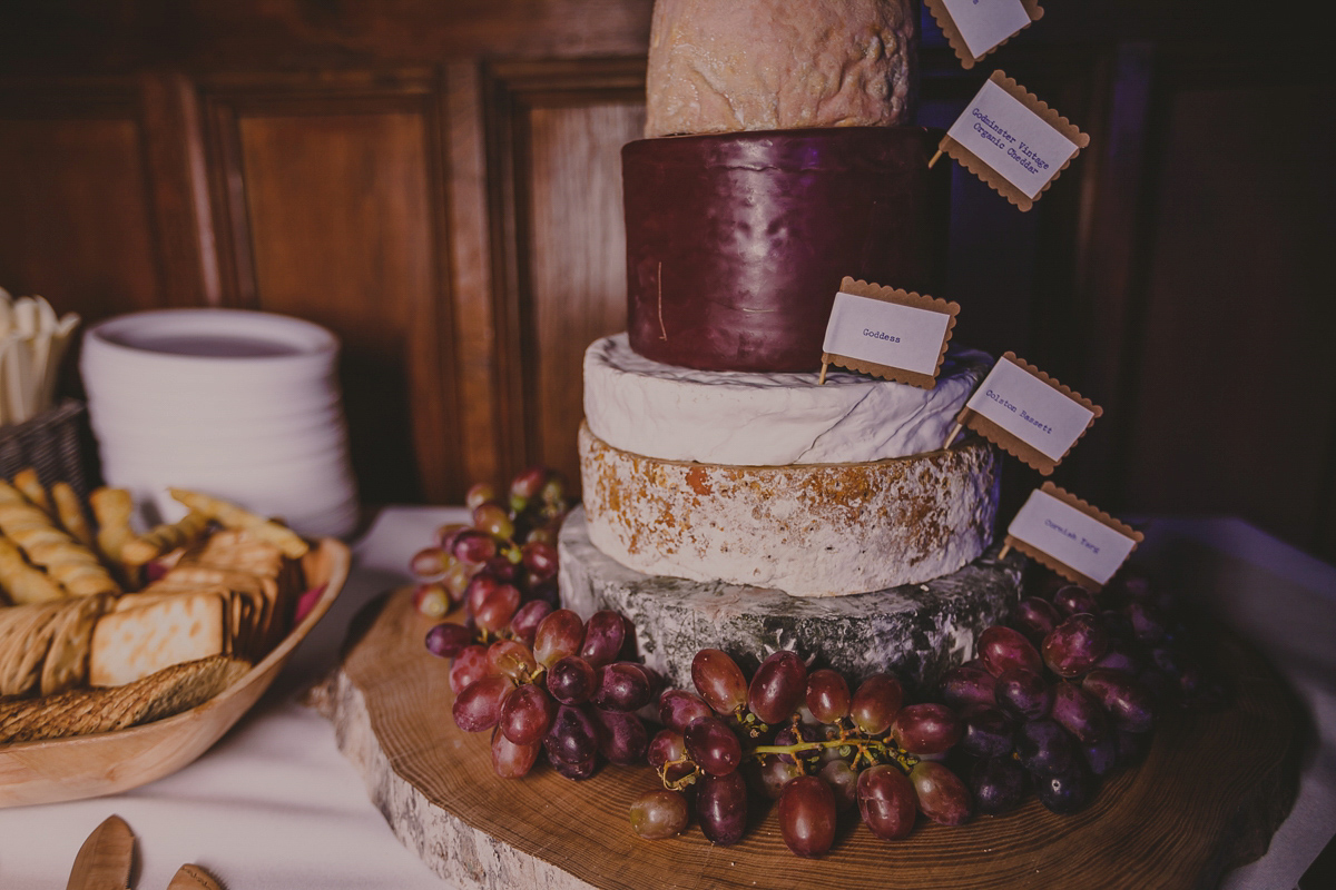 Bride Lucy wore the 'Peony' gown by Naomi Neoh for her romantic and elegant gin inspired wedding in the Lake District. Photography by Lottie Elizabeth.