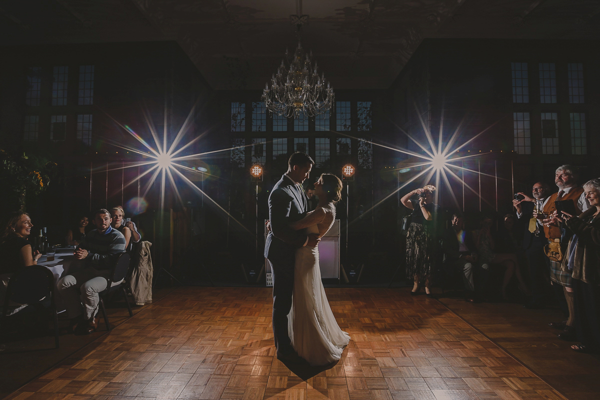 Bride Lucy wore the 'Peony' gown by Naomi Neoh for her romantic and elegant gin inspired wedding in the Lake District. Photography by Lottie Elizabeth.