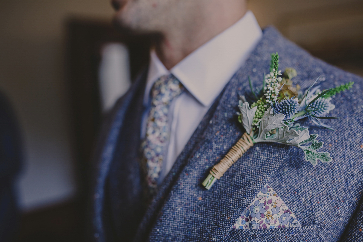 Bride Lucy wore the 'Peony' gown by Naomi Neoh for her romantic and elegant gin inspired wedding in the Lake District. Photography by Lottie Elizabeth.