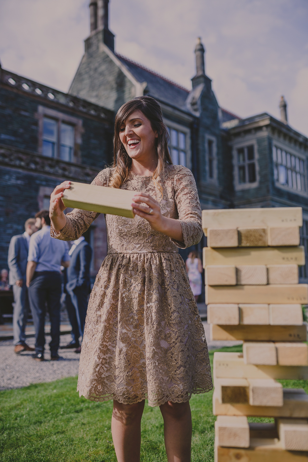 Bride Lucy wore the 'Peony' gown by Naomi Neoh for her romantic and elegant gin inspired wedding in the Lake District. Photography by Lottie Elizabeth.