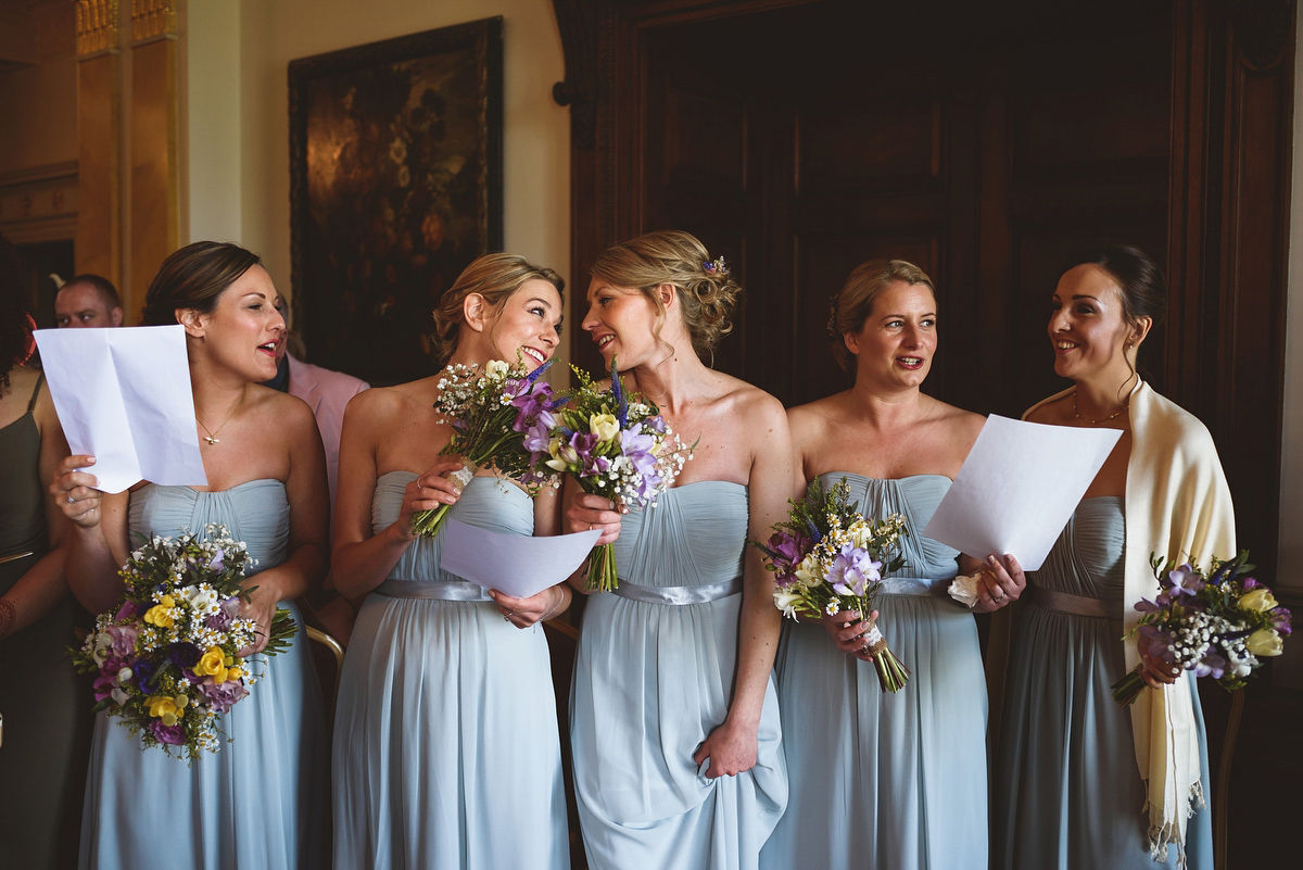 Bride Sarah wore a Lusan Mandongus gown and a dried flower headpiece for her relaxed and elegant wedding at Walcot Hall. Photography by Jackson & Co.