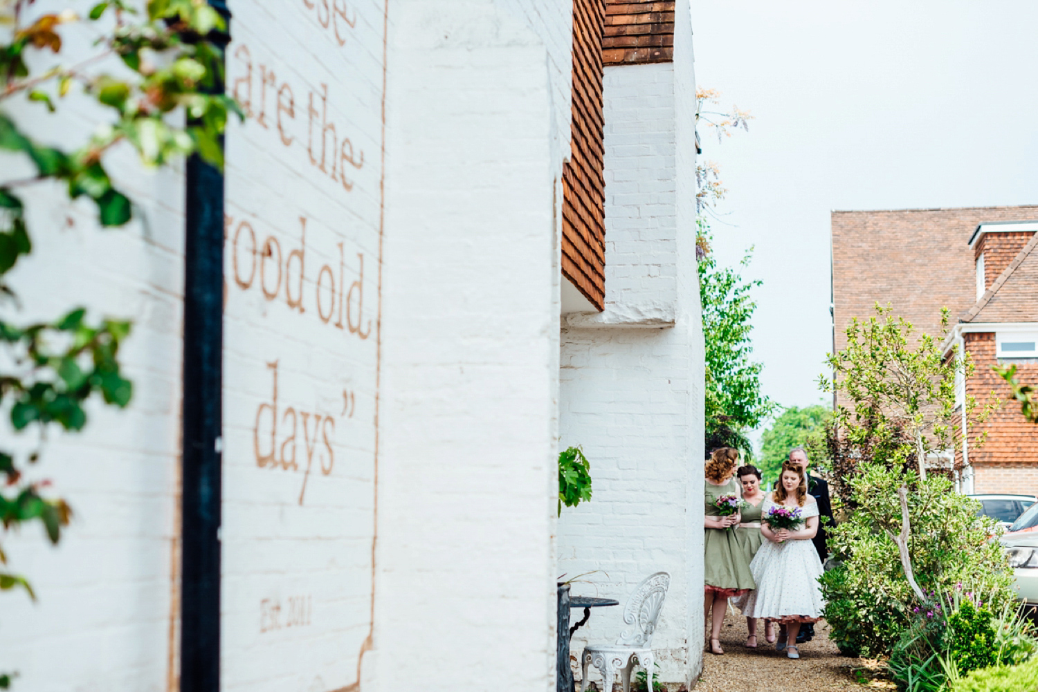 Bride Frankie wore a 1950's inspired, colourful polka dot dress by 'Oh My Honey' for her geek-chic and reto inspired wedding. Photography by Anna Pumer.