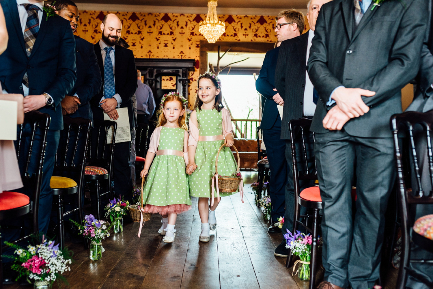 Bride Frankie wore a 1950's inspired, colourful polka dot dress by 'Oh My Honey' for her geek-chic and reto inspired wedding. Photography by Anna Pumer.