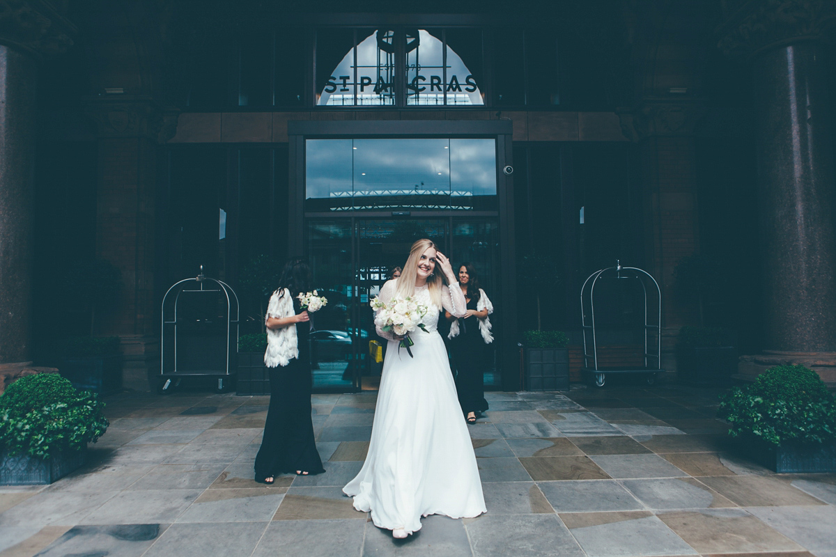 Ash wore a Jesus Peiro gown and winged shoes by Sophia Webster for her stripped back and fuss free wedding in London. Captured by September Pictures.