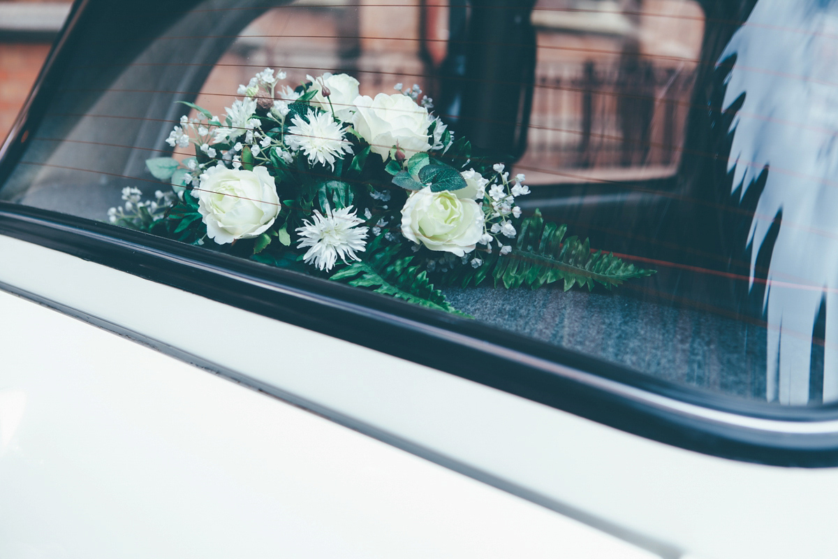 Ash wore a Jesus Peiro gown and winged shoes by Sophia Webster for her stripped back and fuss free wedding in London. Captured by September Pictures.