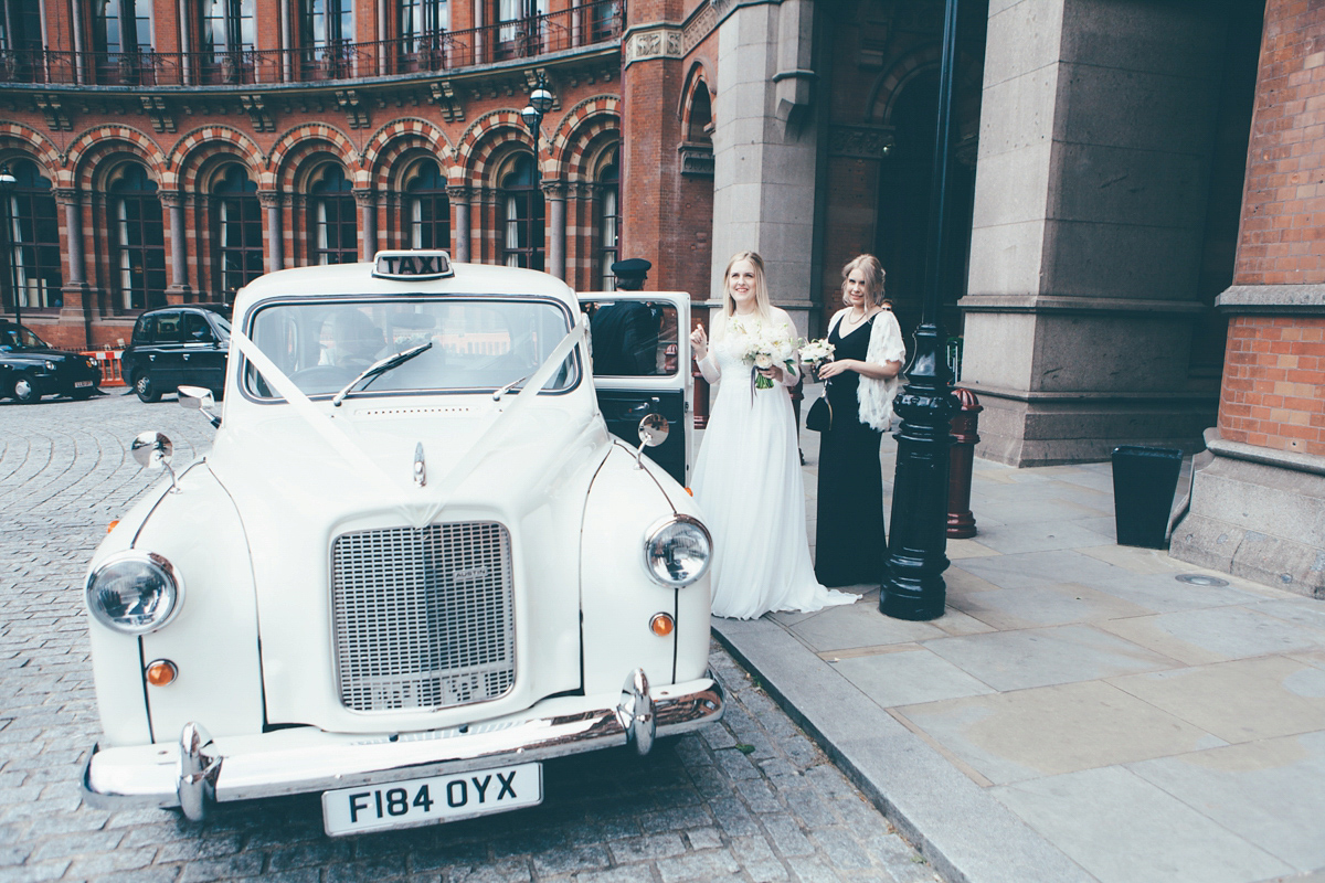 Ash wore a Jesus Peiro gown and winged shoes by Sophia Webster for her stripped back and fuss free wedding in London. Captured by September Pictures.