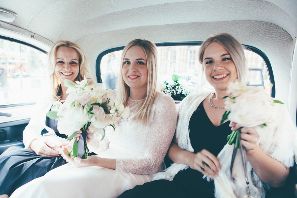 Ash wore a Jesus Peiro gown and winged shoes by Sophia Webster for her stripped back and fuss free wedding in London. Captured by September Pictures.