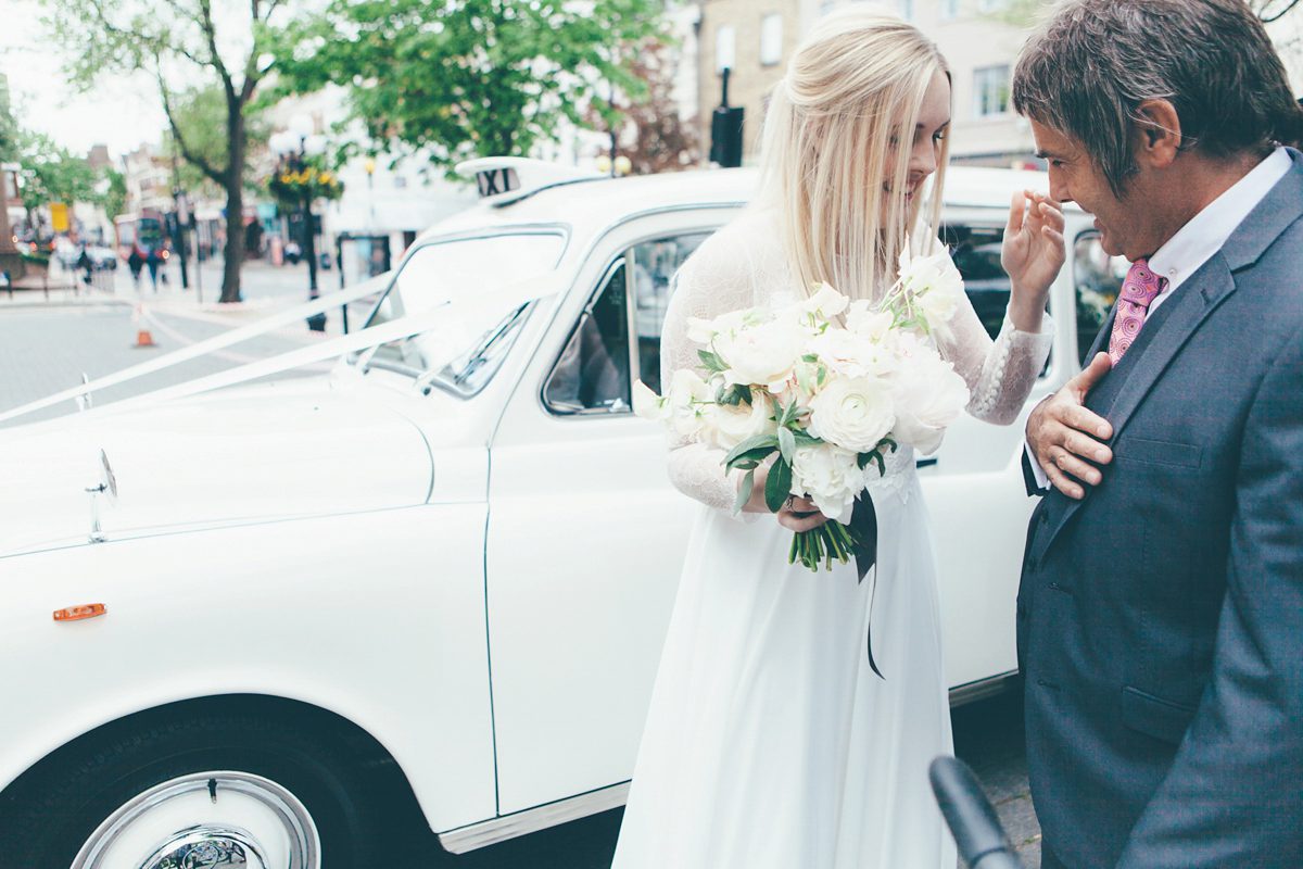 Ash wore a Jesus Peiro gown and winged shoes by Sophia Webster for her stripped back and fuss free wedding in London. Captured by September Pictures.