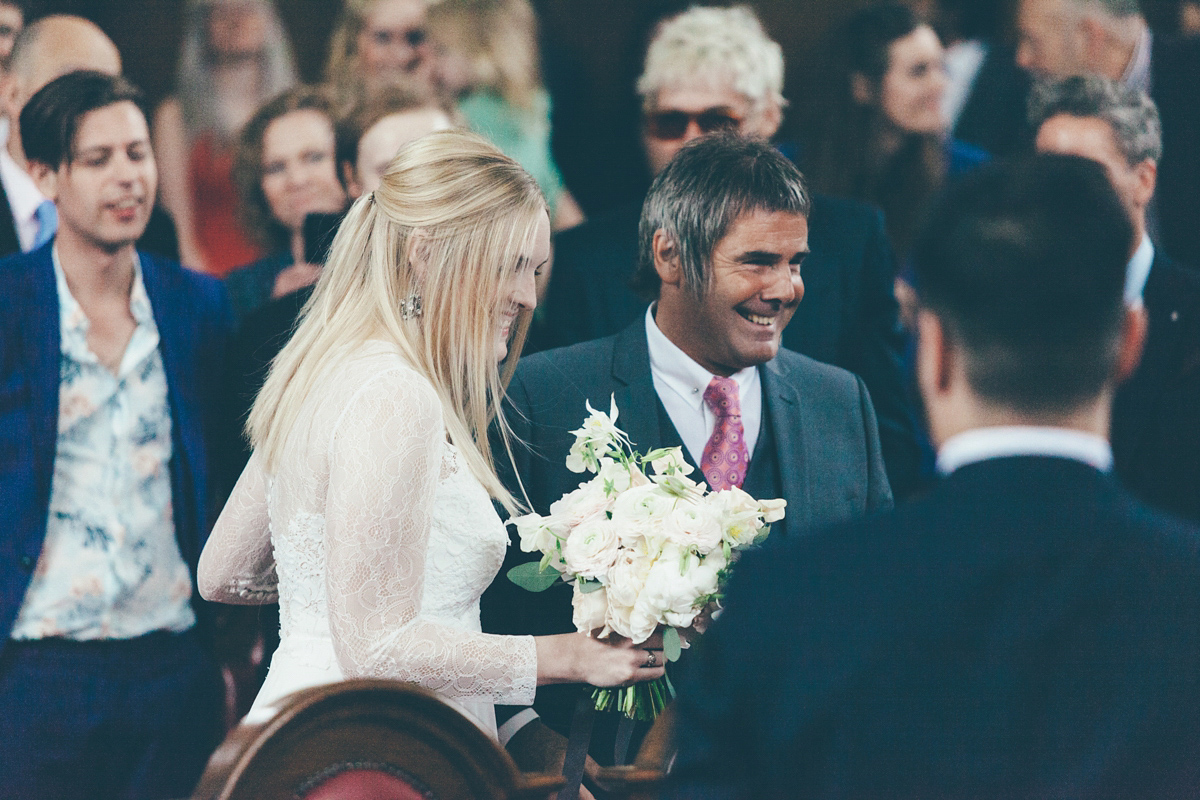 Ash wore a Jesus Peiro gown and winged shoes by Sophia Webster for her stripped back and fuss free wedding in London. Captured by September Pictures.