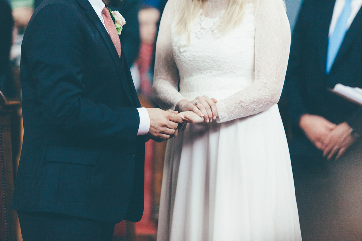 Ash wore a Jesus Peiro gown and winged shoes by Sophia Webster for her stripped back and fuss free wedding in London. Captured by September Pictures.