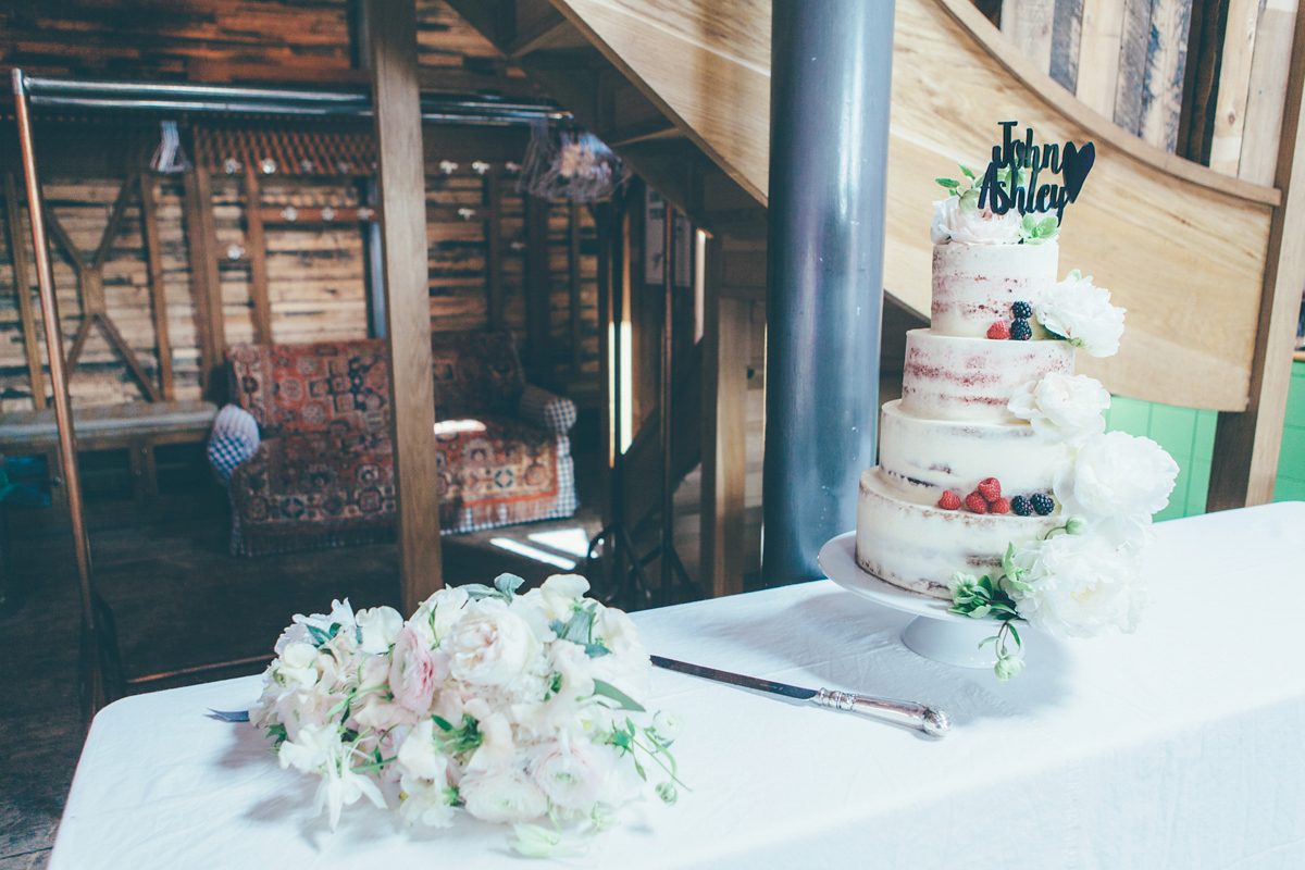 Ash wore a Jesus Peiro gown and winged shoes by Sophia Webster for her stripped back and fuss free wedding in London. Captured by September Pictures.