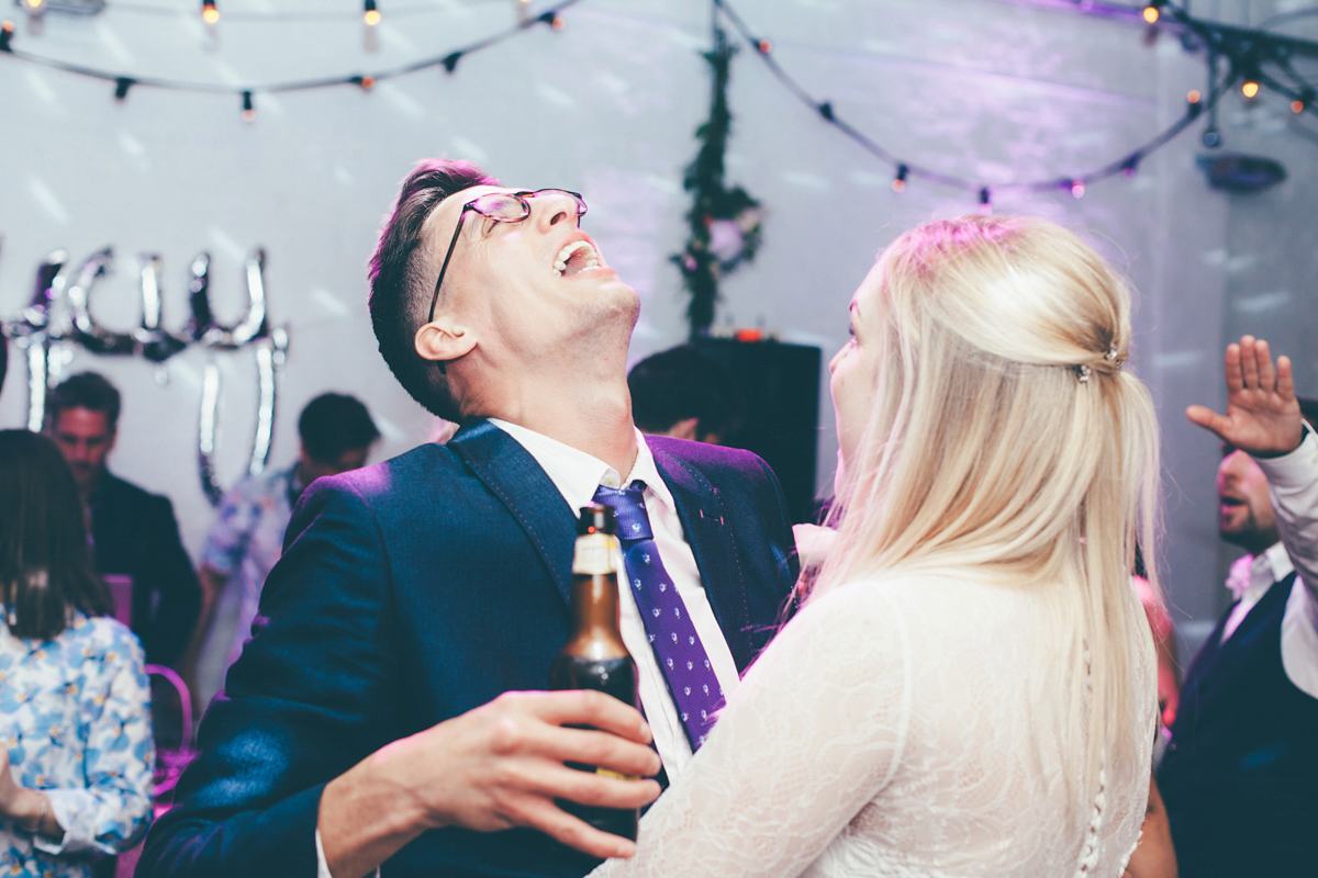 Ash wore a Jesus Peiro gown and winged shoes by Sophia Webster for her stripped back and fuss free wedding in London. Captured by September Pictures.