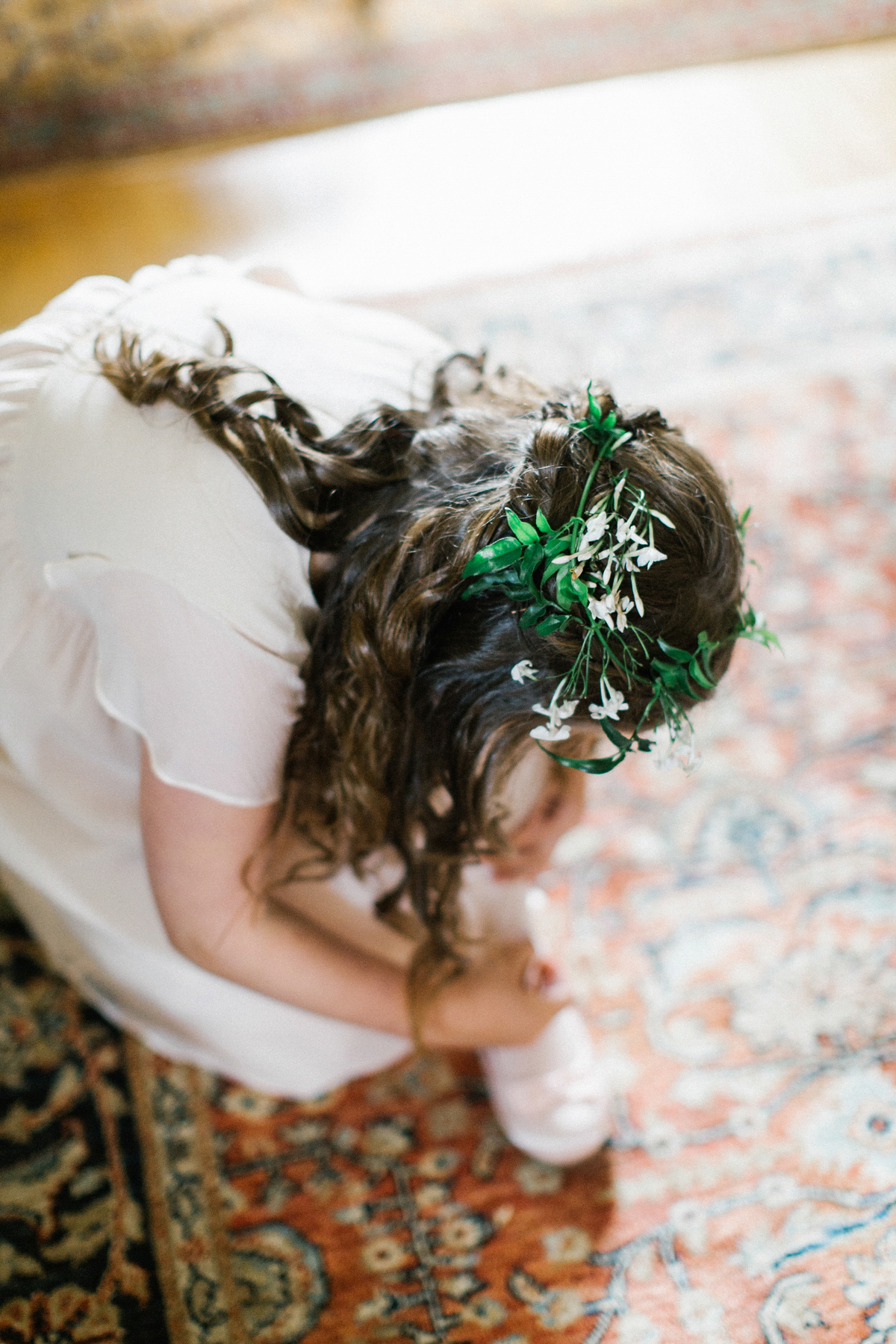 A Spring time wedding in the Lake District inspired by fairies. Bride Rachel wore a dress, veil and velvet shoes by Le Spose di Gio. Fine art wedding photography by Melissa Beattie.