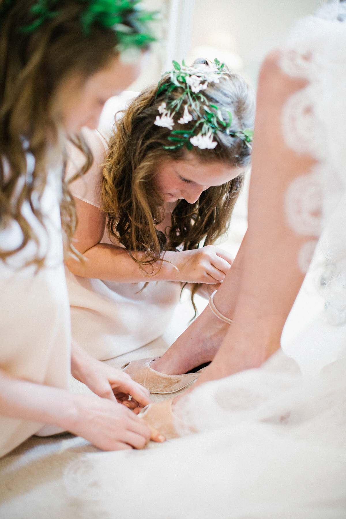 A Spring time wedding in the Lake District inspired by fairies. Bride Rachel wore a dress, veil and velvet shoes by Le Spose di Gio. Fine art wedding photography by Melissa Beattie.