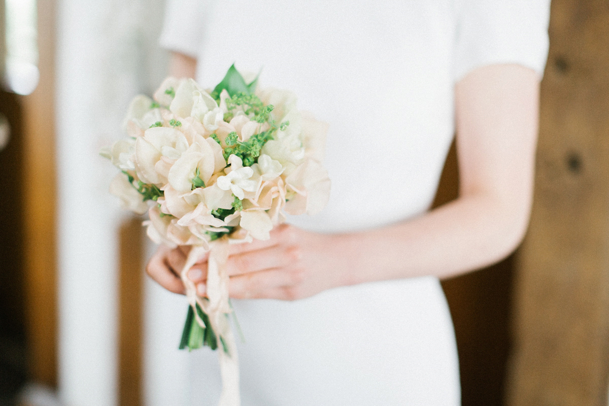 A Spring time wedding in the Lake District inspired by fairies. Bride Rachel wore a dress, veil and velvet shoes by Le Spose di Gio. Fine art wedding photography by Melissa Beattie.