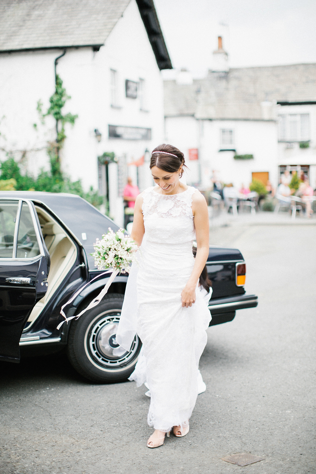 A Spring time wedding in the Lake District inspired by fairies. Bride Rachel wore a dress, veil and velvet shoes by Le Spose di Gio. Fine art wedding photography by Melissa Beattie.