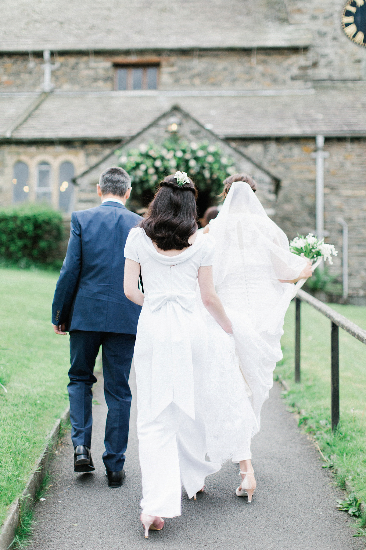 A Spring time wedding in the Lake District inspired by fairies. Bride Rachel wore a dress, veil and velvet shoes by Le Spose di Gio. Fine art wedding photography by Melissa Beattie.