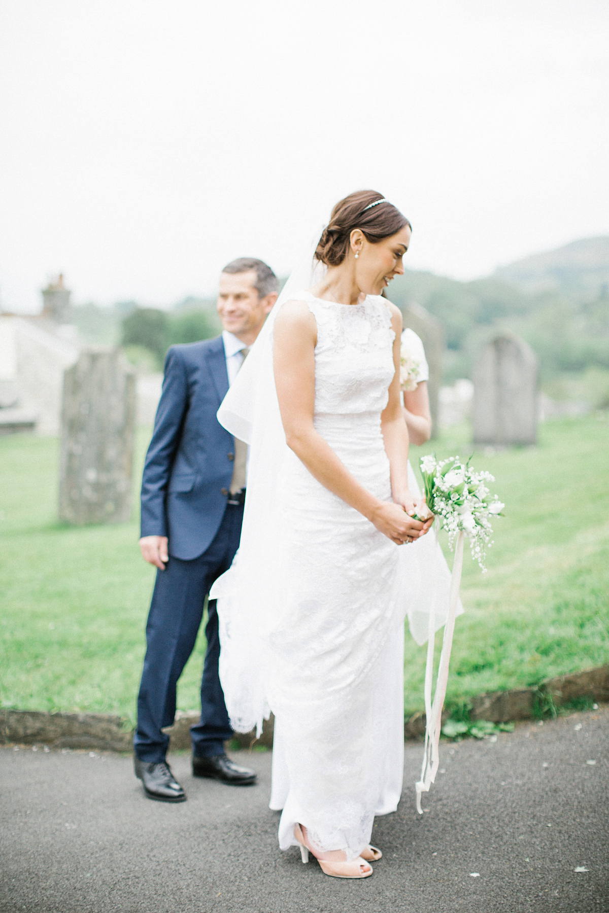 A Spring time wedding in the Lake District inspired by fairies. Bride Rachel wore a dress, veil and velvet shoes by Le Spose di Gio. Fine art wedding photography by Melissa Beattie.