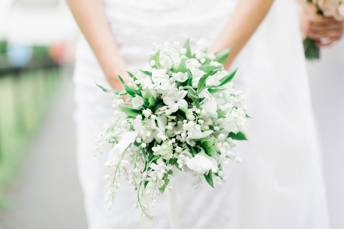 A Spring time wedding in the Lake District inspired by fairies. Bride Rachel wore a dress, veil and velvet shoes by Le Spose di Gio. Fine art wedding photography by Melissa Beattie.