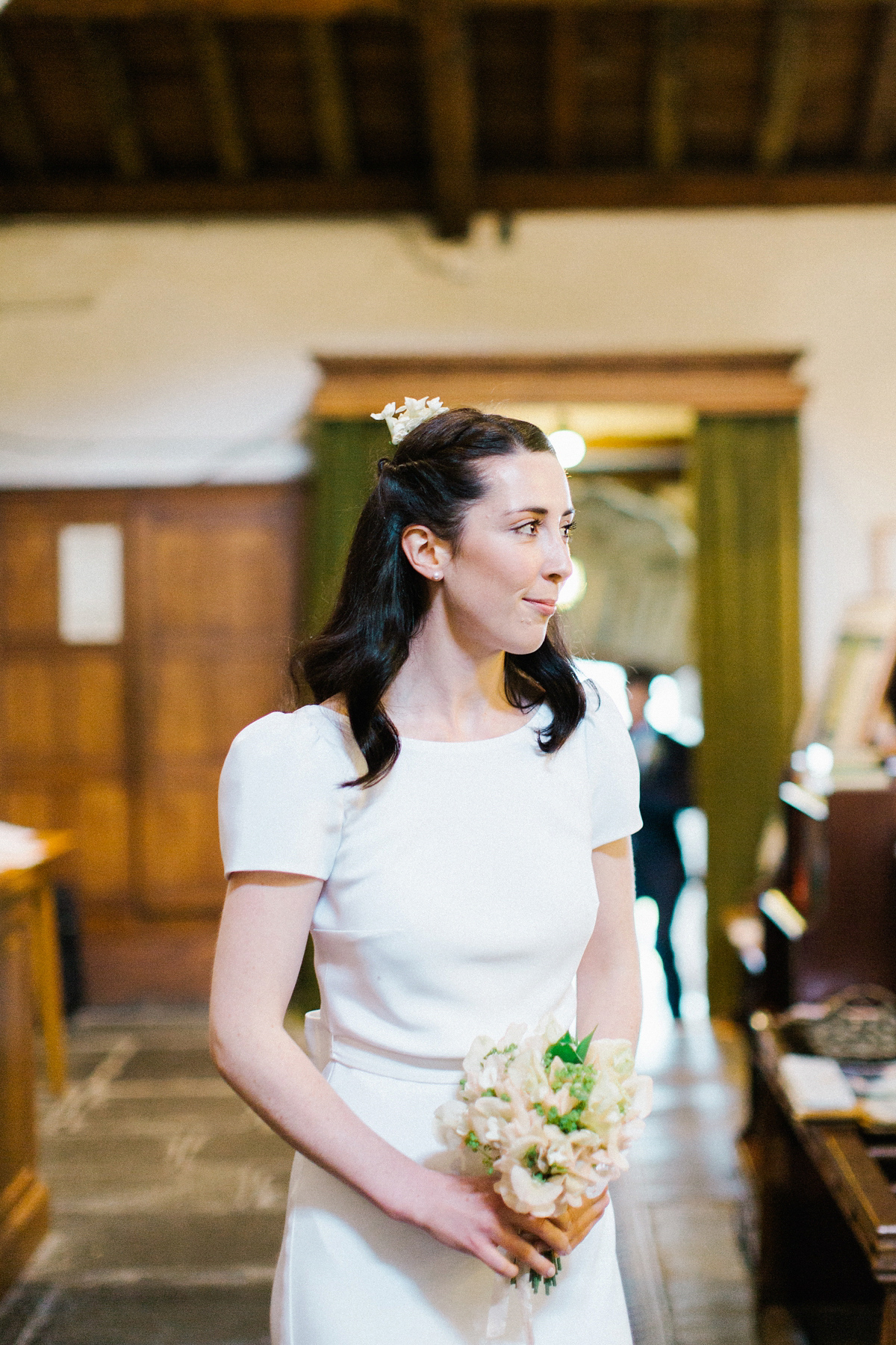 A Spring time wedding in the Lake District inspired by fairies. Bride Rachel wore a dress, veil and velvet shoes by Le Spose di Gio. Fine art wedding photography by Melissa Beattie.