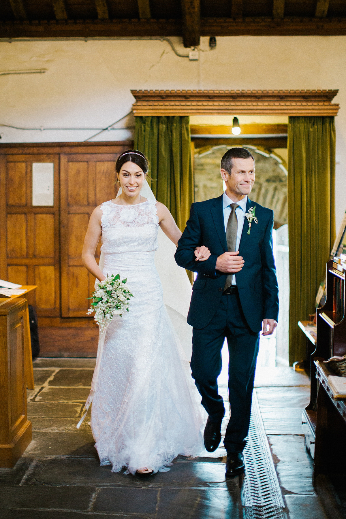 A Spring time wedding in the Lake District inspired by fairies. Bride Rachel wore a dress, veil and velvet shoes by Le Spose di Gio. Fine art wedding photography by Melissa Beattie.