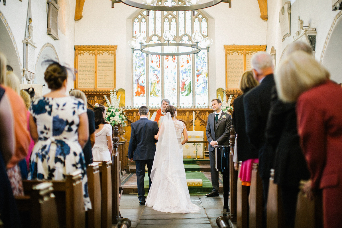 A Spring time wedding in the Lake District inspired by fairies. Bride Rachel wore a dress, veil and velvet shoes by Le Spose di Gio. Fine art wedding photography by Melissa Beattie.