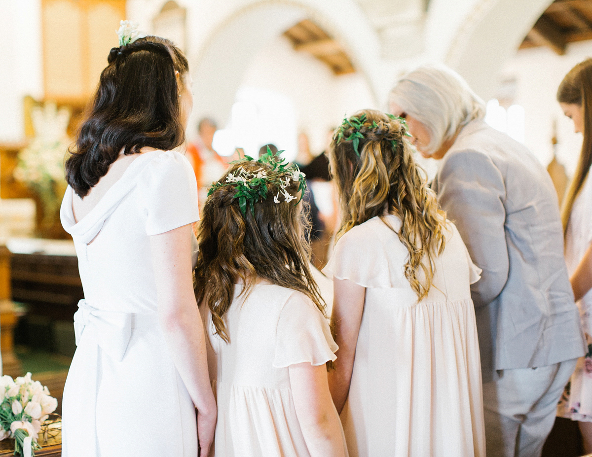 A Spring time wedding in the Lake District inspired by fairies. Bride Rachel wore a dress, veil and velvet shoes by Le Spose di Gio. Fine art wedding photography by Melissa Beattie.