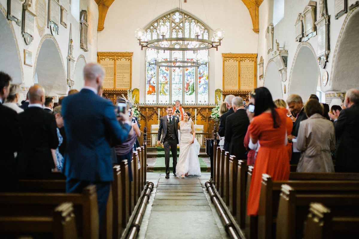 A Spring time wedding in the Lake District inspired by fairies. Bride Rachel wore a dress, veil and velvet shoes by Le Spose di Gio. Fine art wedding photography by Melissa Beattie.