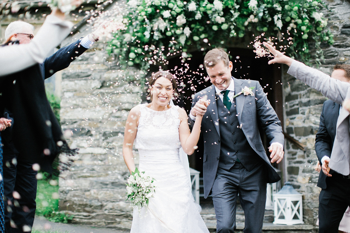 A Spring time wedding in the Lake District inspired by fairies. Bride Rachel wore a dress, veil and velvet shoes by Le Spose di Gio. Fine art wedding photography by Melissa Beattie.