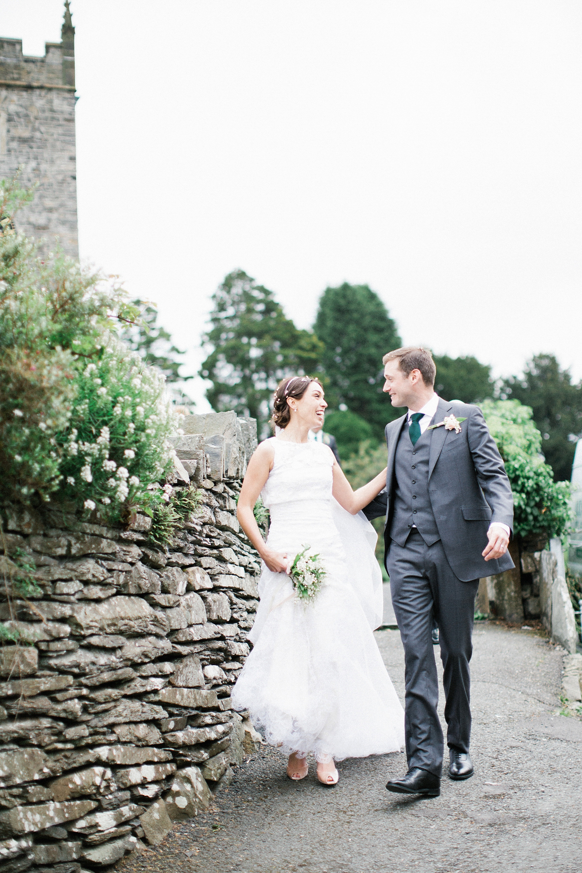 A Spring time wedding in the Lake District inspired by fairies. Bride Rachel wore a dress, veil and velvet shoes by Le Spose di Gio. Fine art wedding photography by Melissa Beattie.