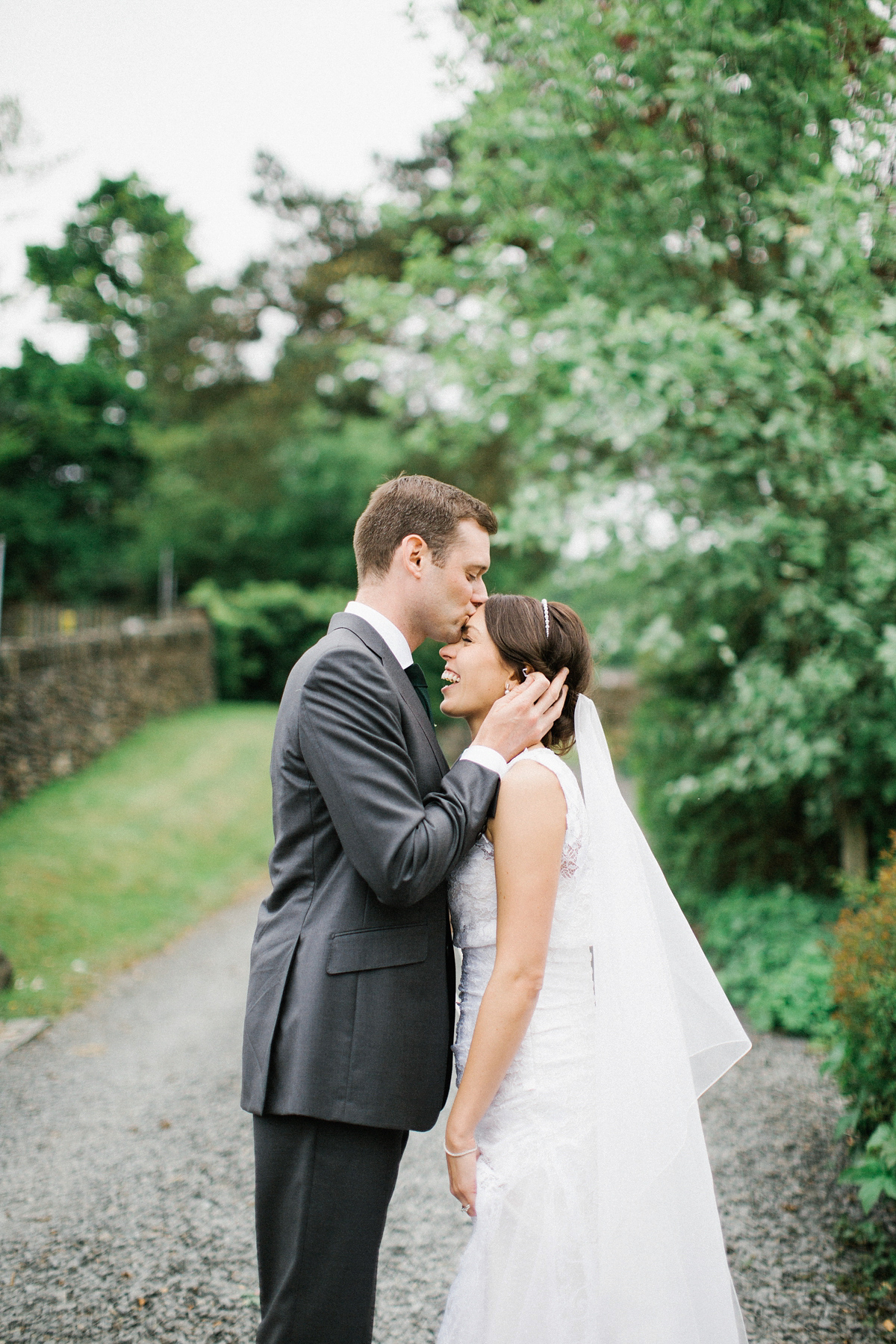 A Spring time wedding in the Lake District inspired by fairies. Bride Rachel wore a dress, veil and velvet shoes by Le Spose di Gio. Fine art wedding photography by Melissa Beattie.