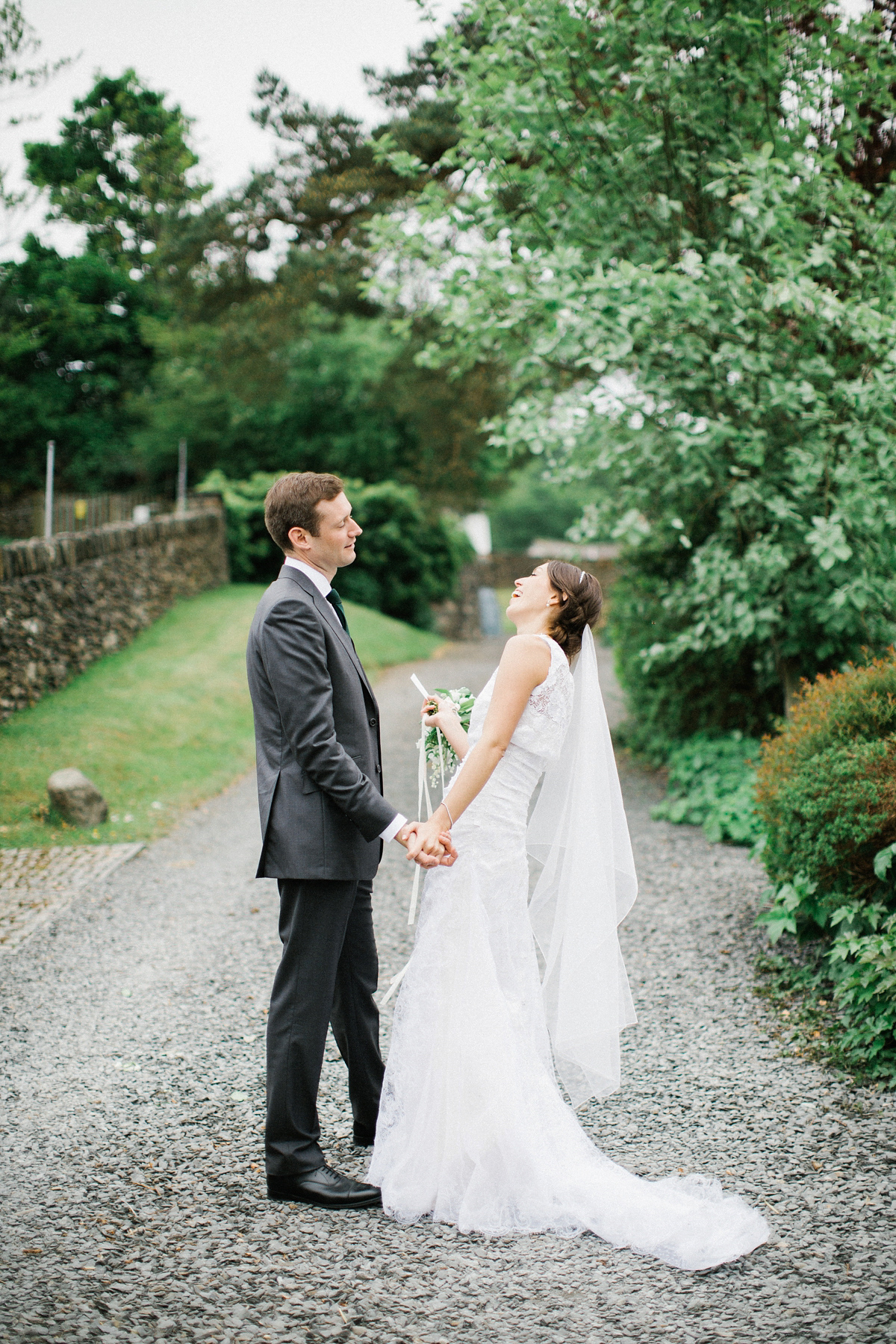 A Spring time wedding in the Lake District inspired by fairies. Bride Rachel wore a dress, veil and velvet shoes by Le Spose di Gio. Fine art wedding photography by Melissa Beattie.